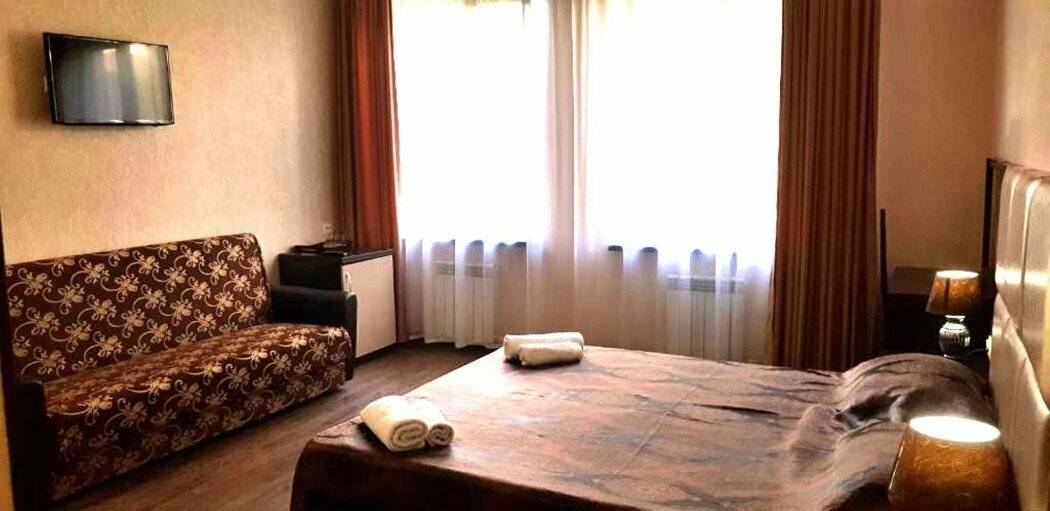 Фотографии номера Четырехместный номер в Гостинице Вавилон Геленджик